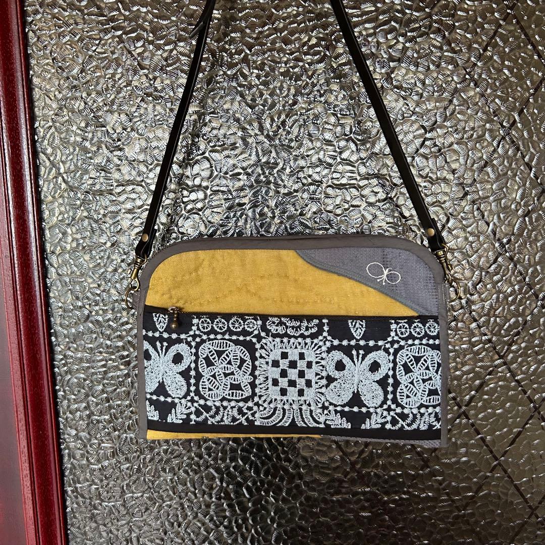 ミナペルホネン　通帳特大バッグ　キルト　papurikko マスタード