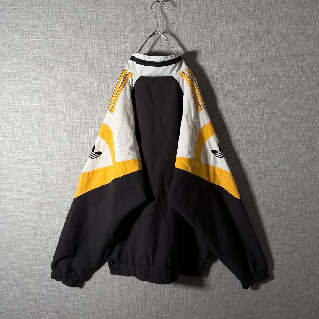 90s★adidas 万国旗タグ ナイロンジャケット 刺繍 アームロゴ L程度