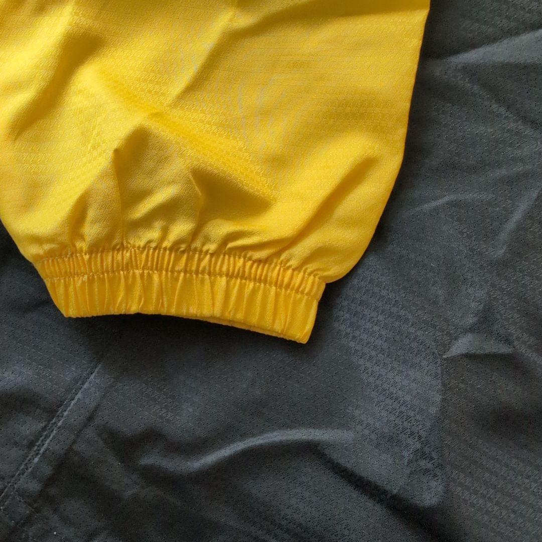 ATHLETA ピステ上下セット 150 黒/黄色