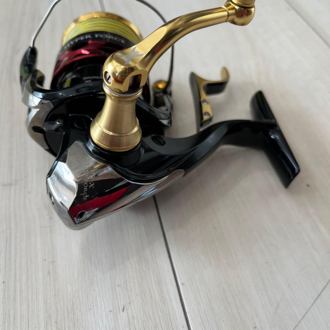 j2500DXG スピニングリール ブラック/ゴールドベイシス竿