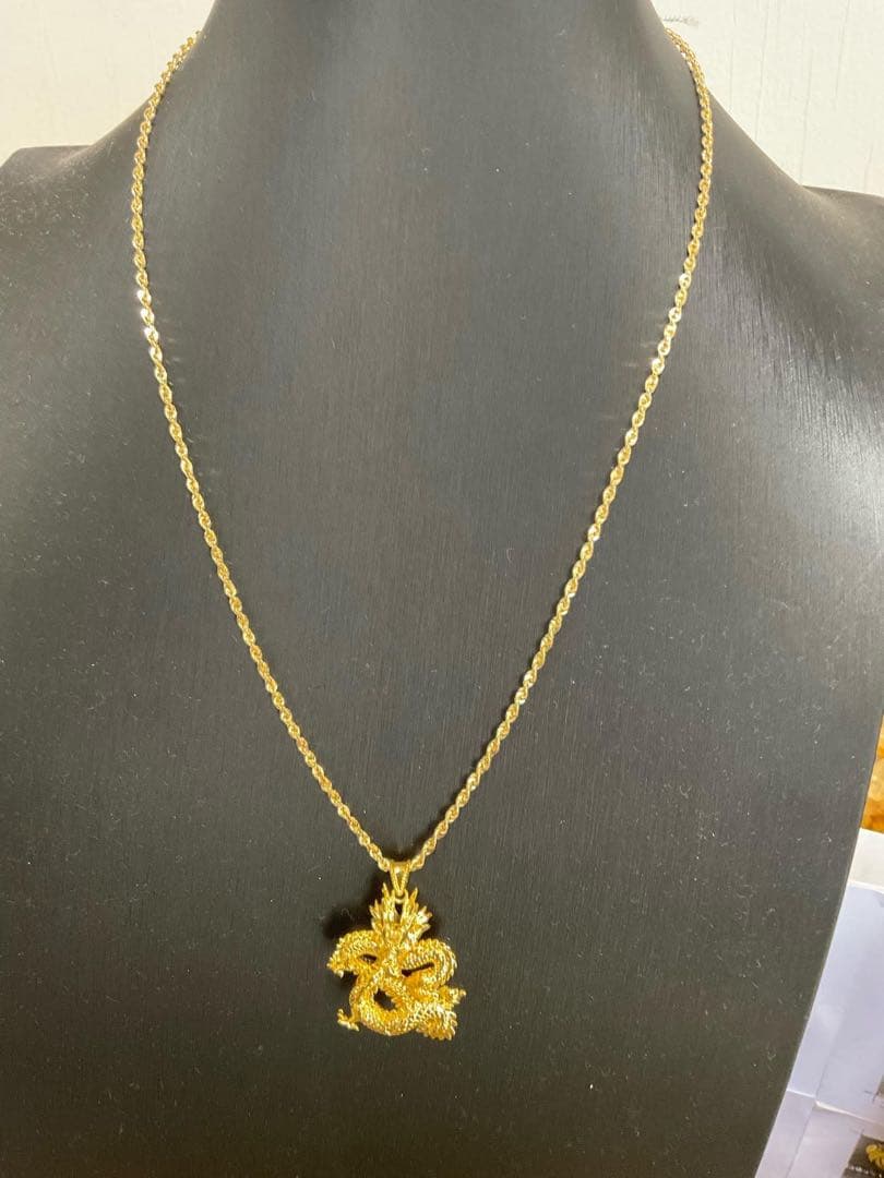 18 K ドラゴンペンダント (1 gram) とxiomi watch