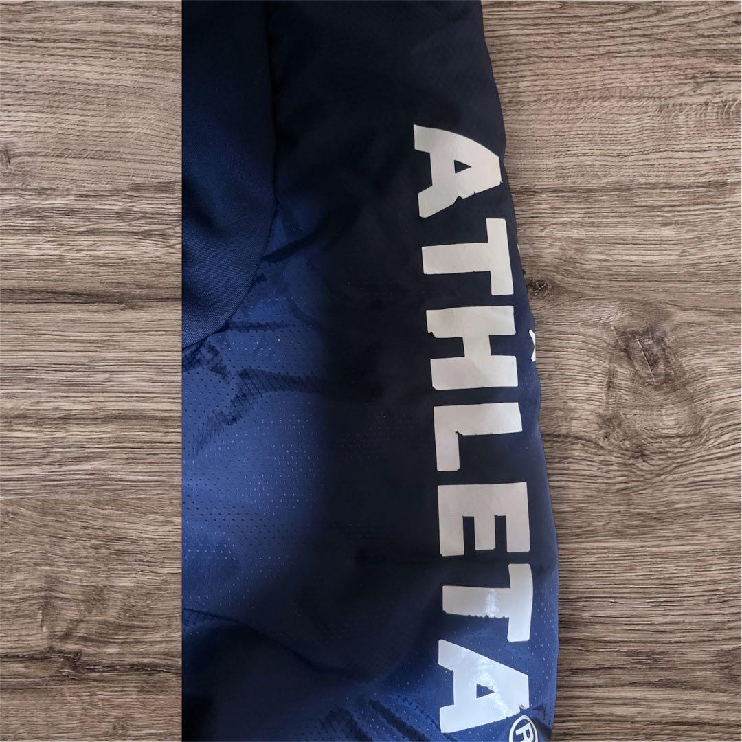ATHLETA ピステ・ウィンドブレーカーセット ネイビー　Lサイズ