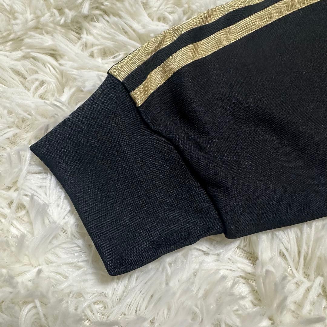 アディダス トレフォイル ロゴ刺繍 トラックジャケット ブラック 黒 金色