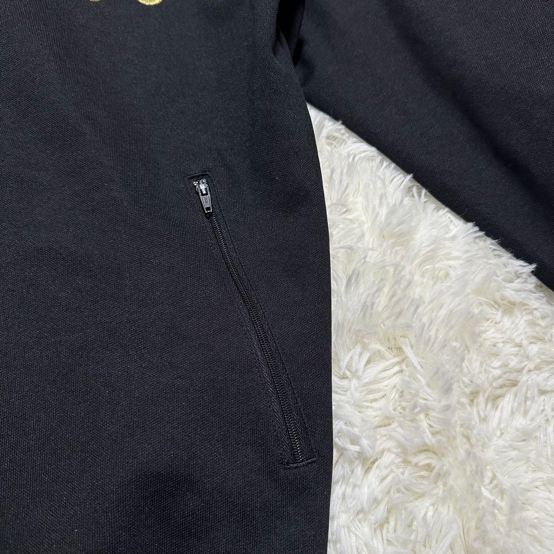 アディダス トレフォイル ロゴ刺繍 トラックジャケット ブラック 黒 金色