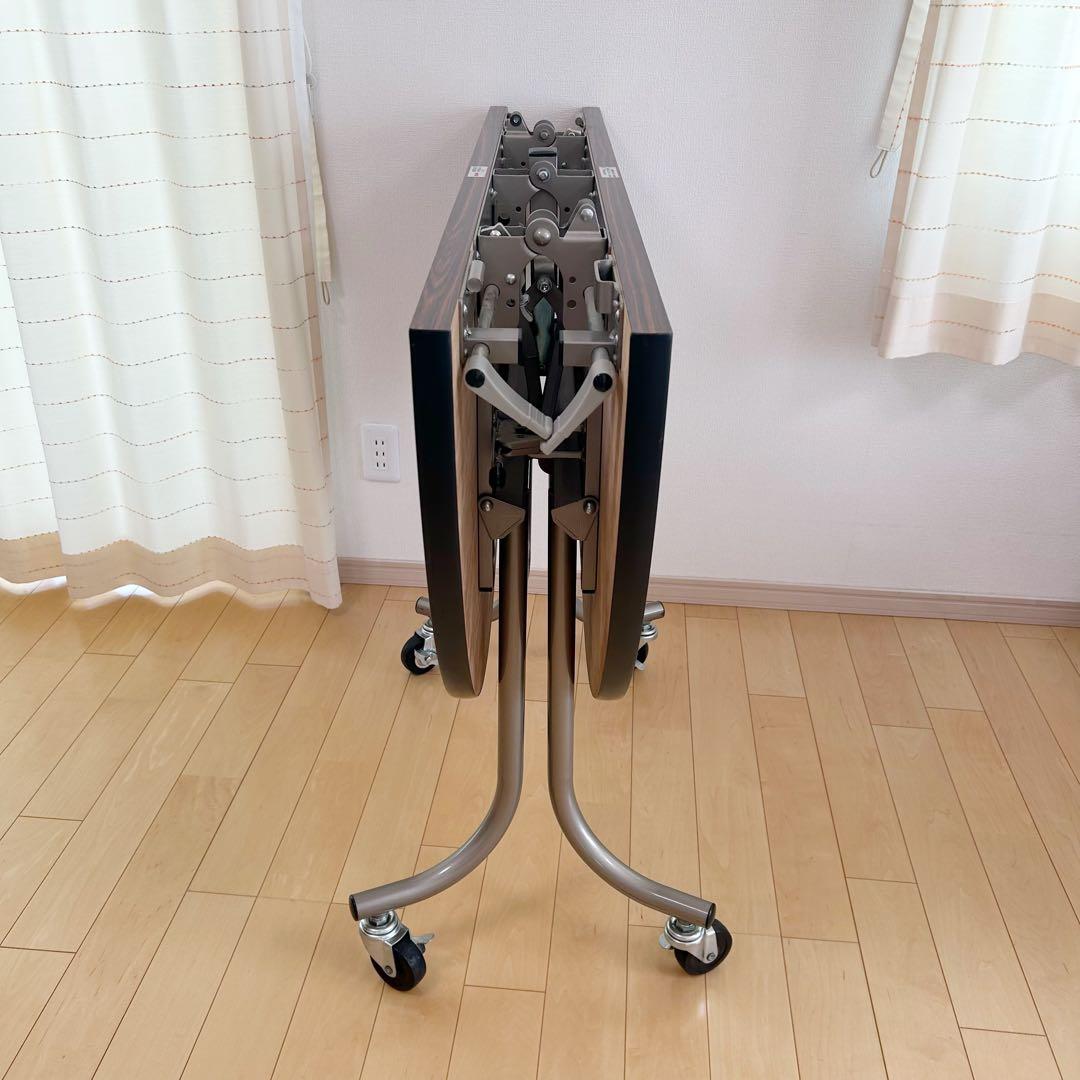 フライト式円型テーブル　折りたたみテーブル　直径120cm 丸テーブルキャスター