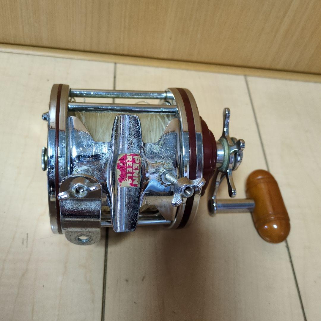 1000 THRUST 両軸リール シルバー/レッド