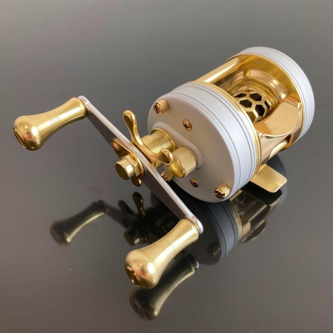 【新品】渓流ベイトリール 丸型リール トラウト用 ゴールド／シルバー