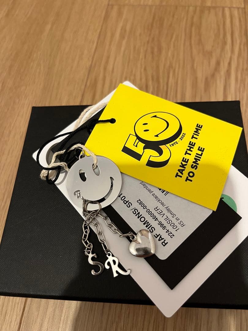 ラフシモンズ　スマイル　スマイリー　キーホルダー　新品未使用