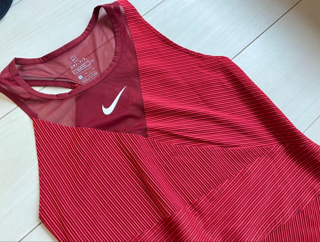 美品＊NIKEナイキ＊アシンメトリーとメッシュスリットが可愛いテニスドレスM