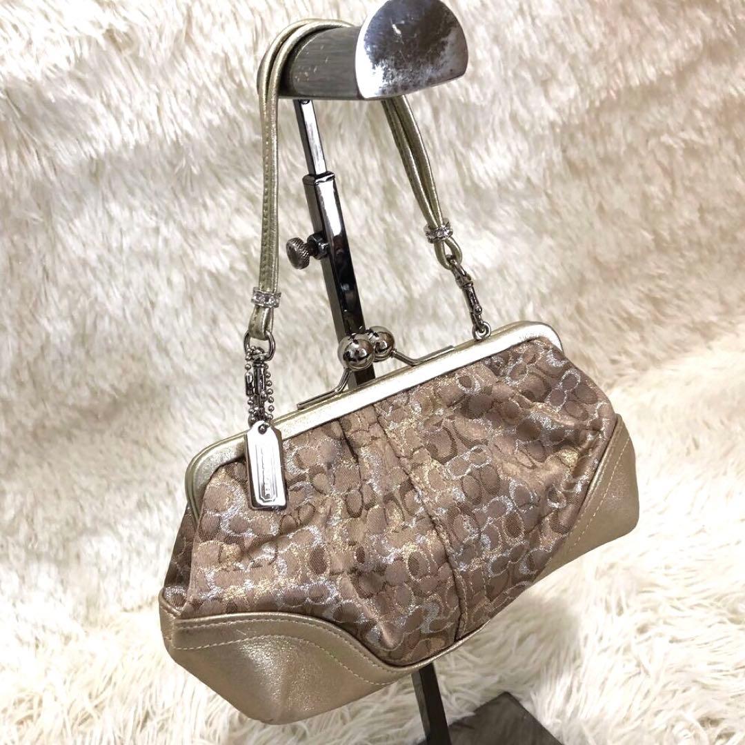 コーチ レザー ミニ ハンドバッグ シグネチャー キャンバス ガマ口