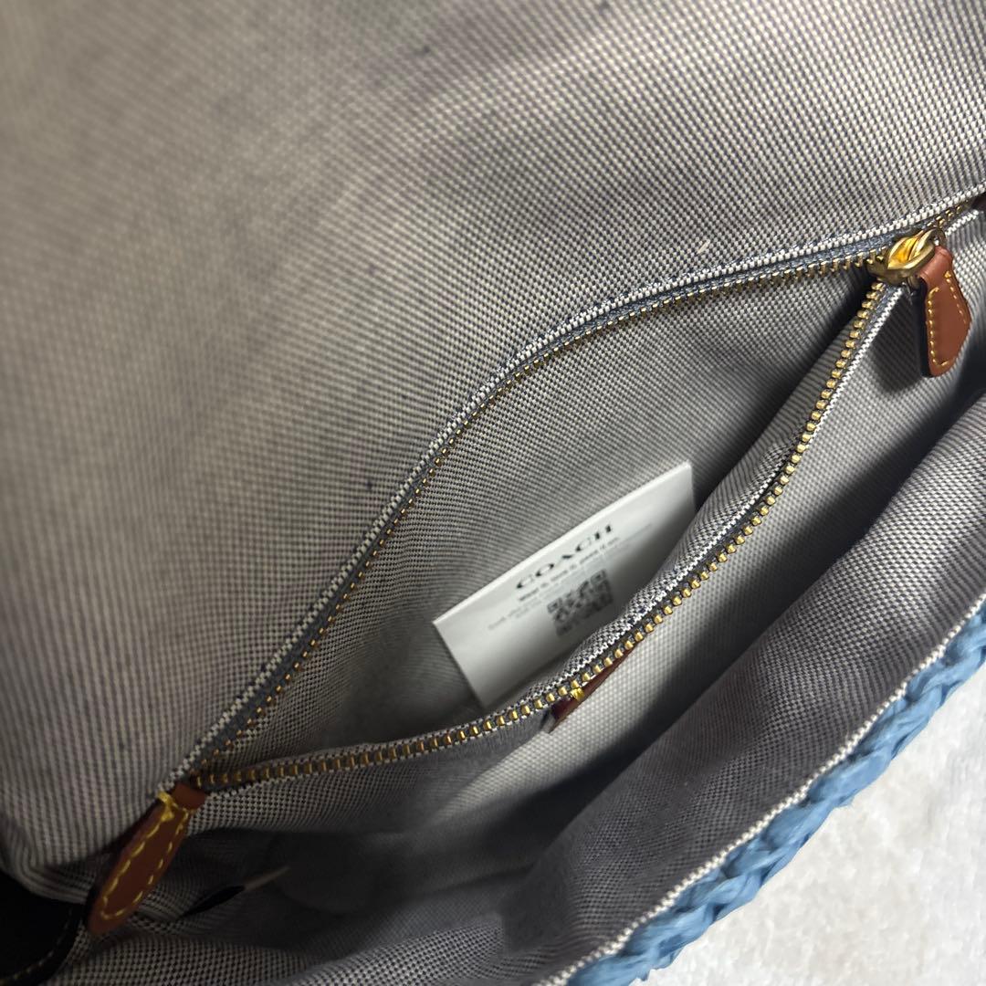 COACH チェリー柄ストロー素材ハンドバッグ