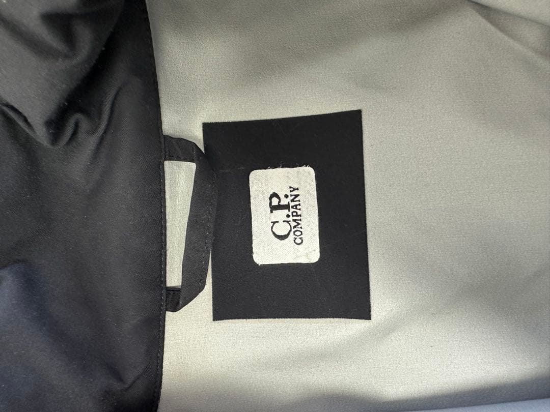 C.P. Company ゴーグルブラックナイロンジャケット フード付き
