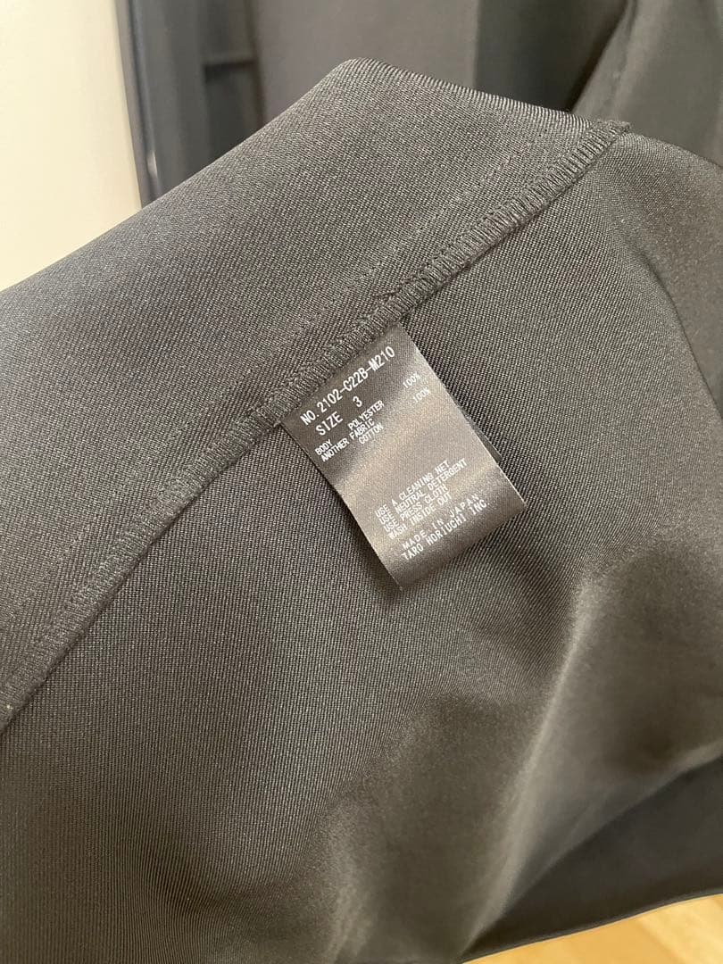 フード付き黒モッズコート