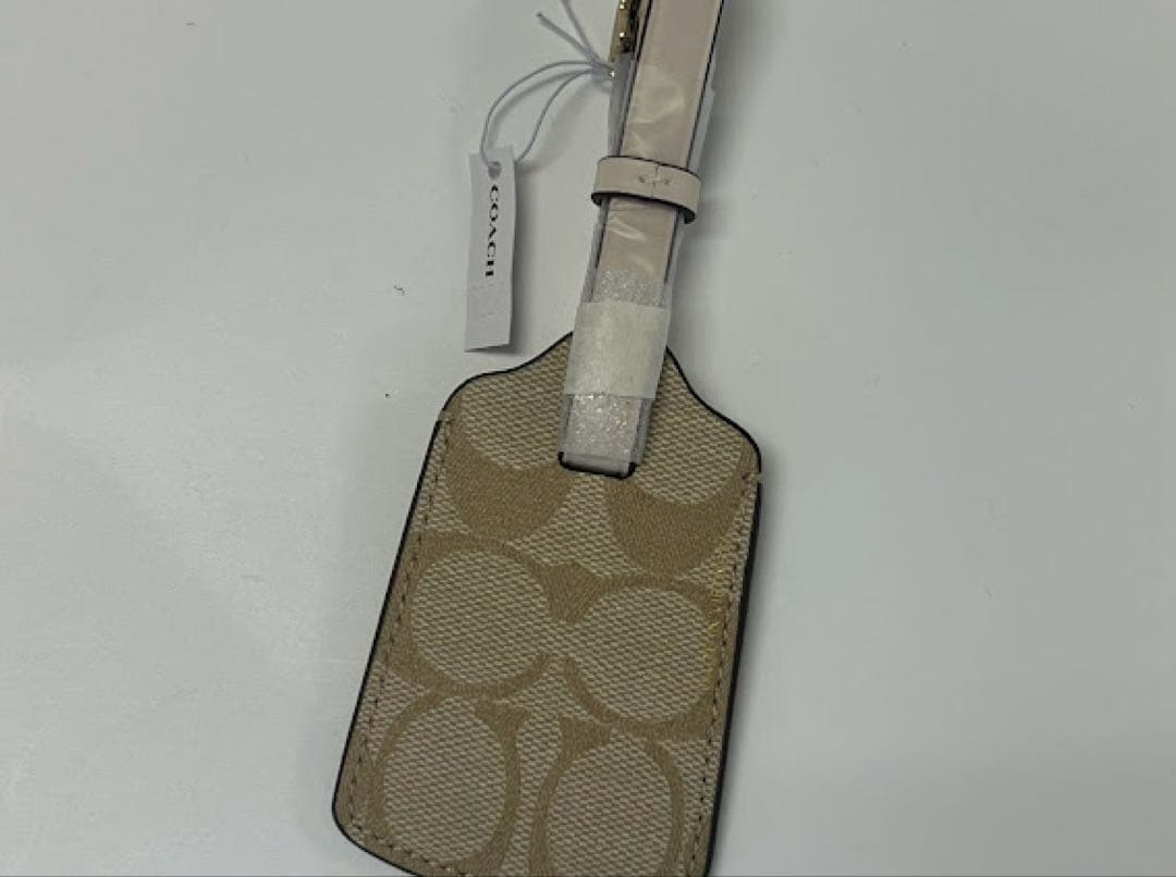 ☆正規品☆コーチ ネームタグ シグネチャー ラゲッジタグ ライトカーキ×チョーク