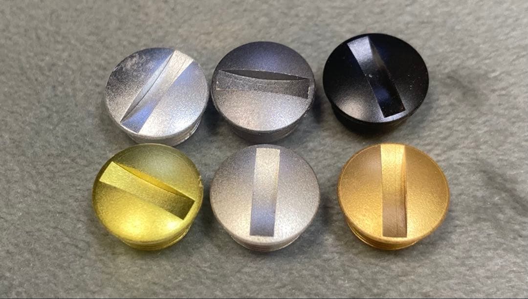 わたらせ樹脂工房製花梨瘤紅白紅少なめ　丸型　シマノ用