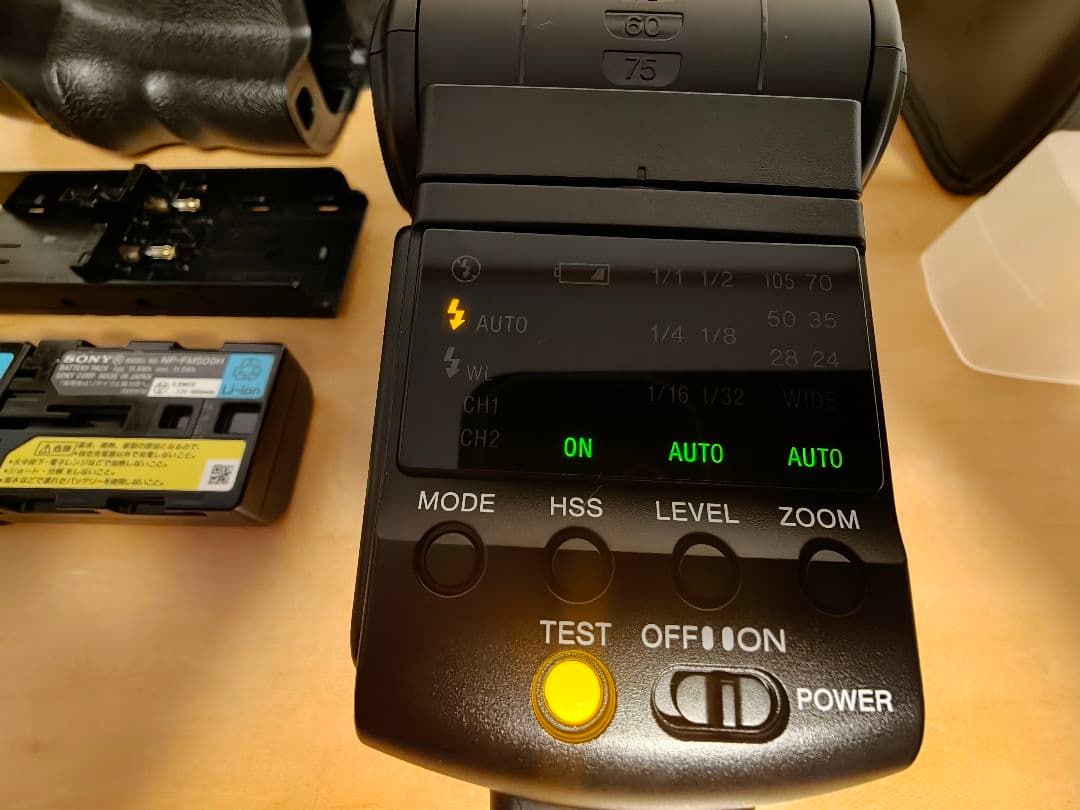 SONY α77 SLT-A77V + VG-C77AM　+　HVL-F42AM