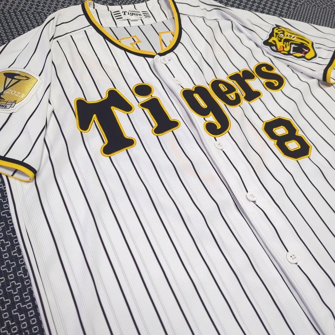 阪神タイガース　チャンピオン　エンブレム付き　ユニフォーム　佐藤輝明【Ｌサイズ】