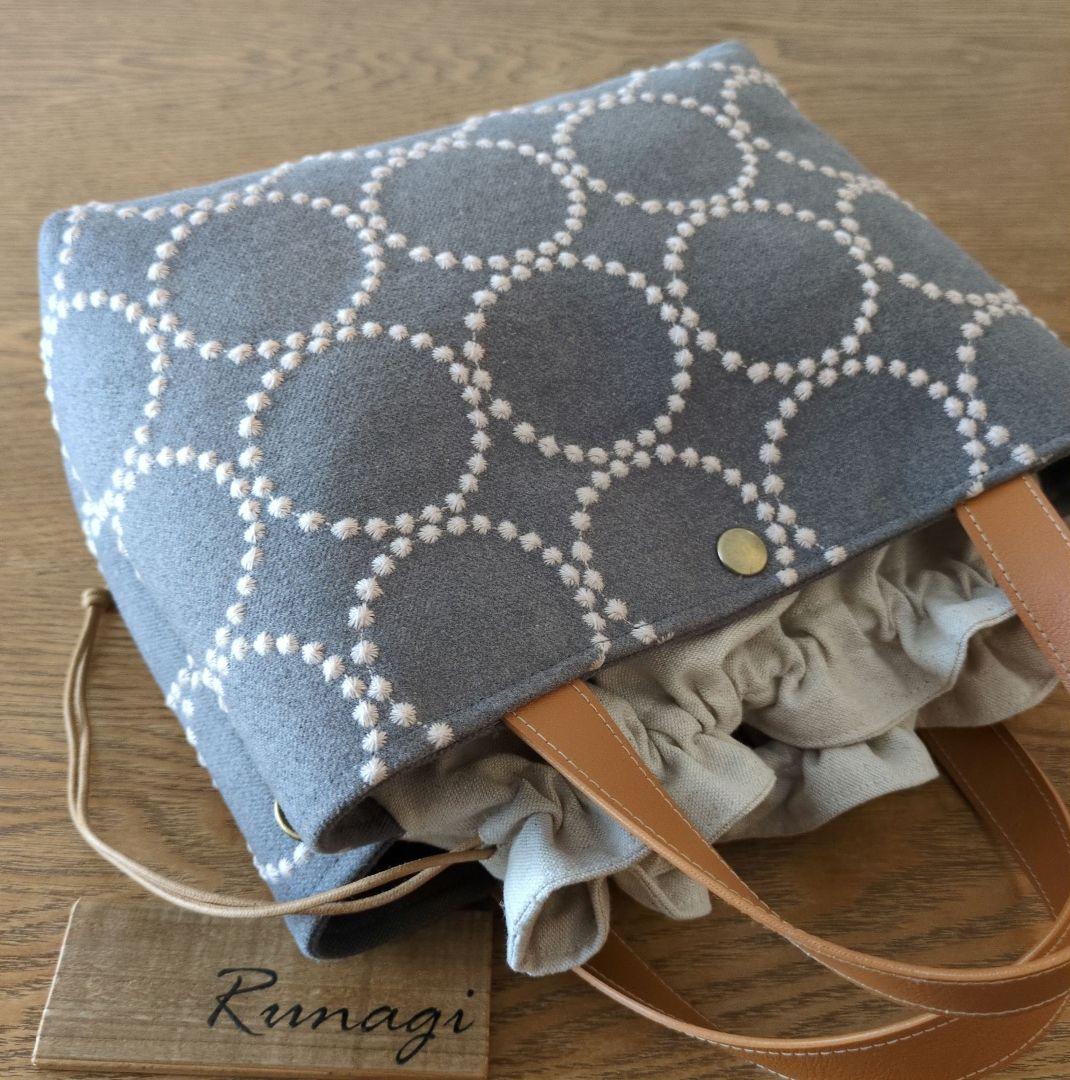 【1572】あおりポケットの巾着バッグ＊ミナペルホネン