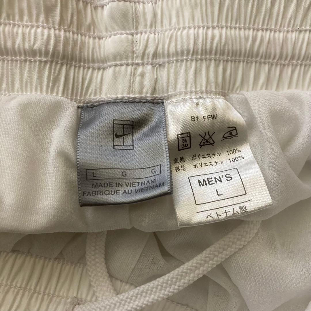 p41 NIKE ホワイト ウィンドブレーカー パンツ　L