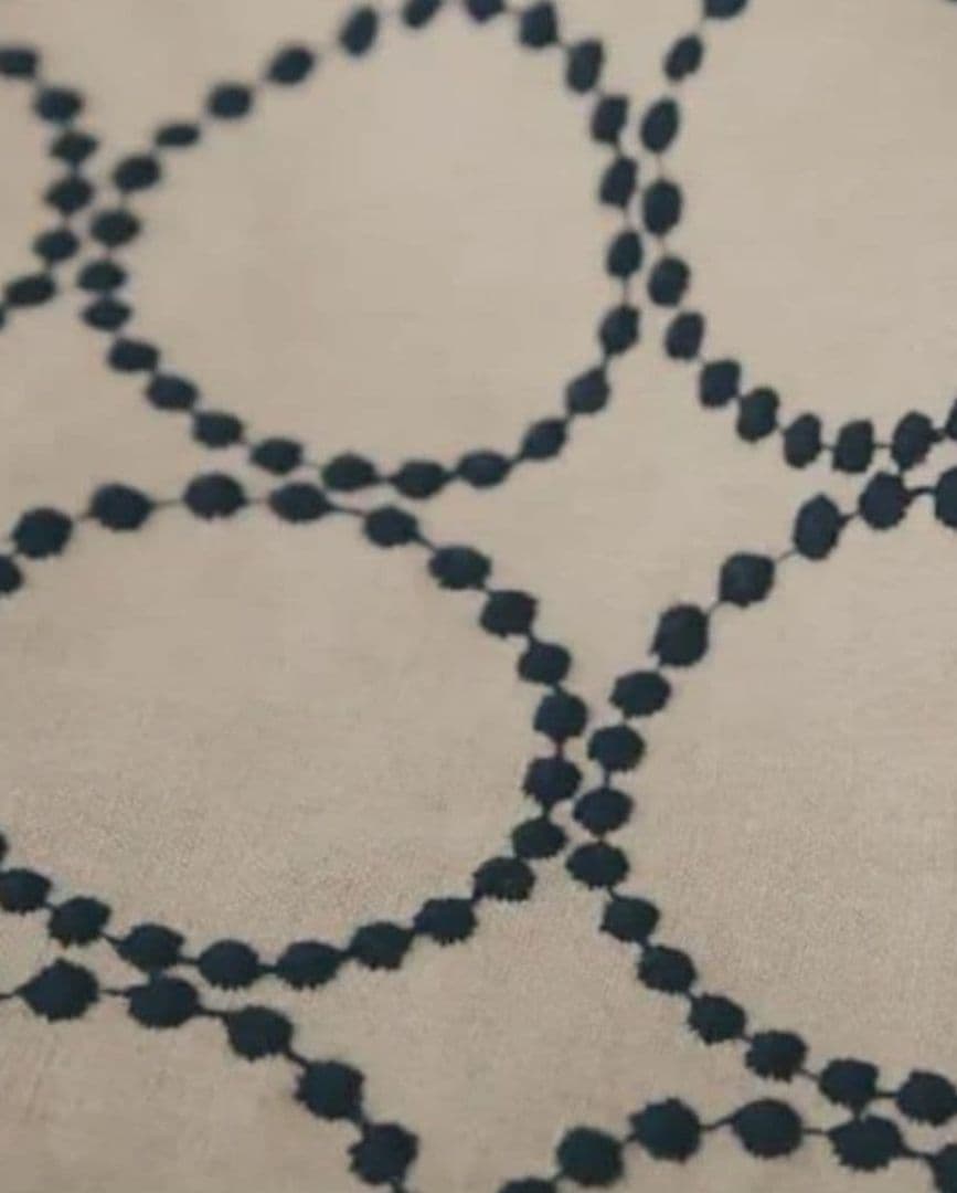 両面たのしめてA4が入る『丸みを帯びた肩掛けトートバッグ』ミナペルホネン