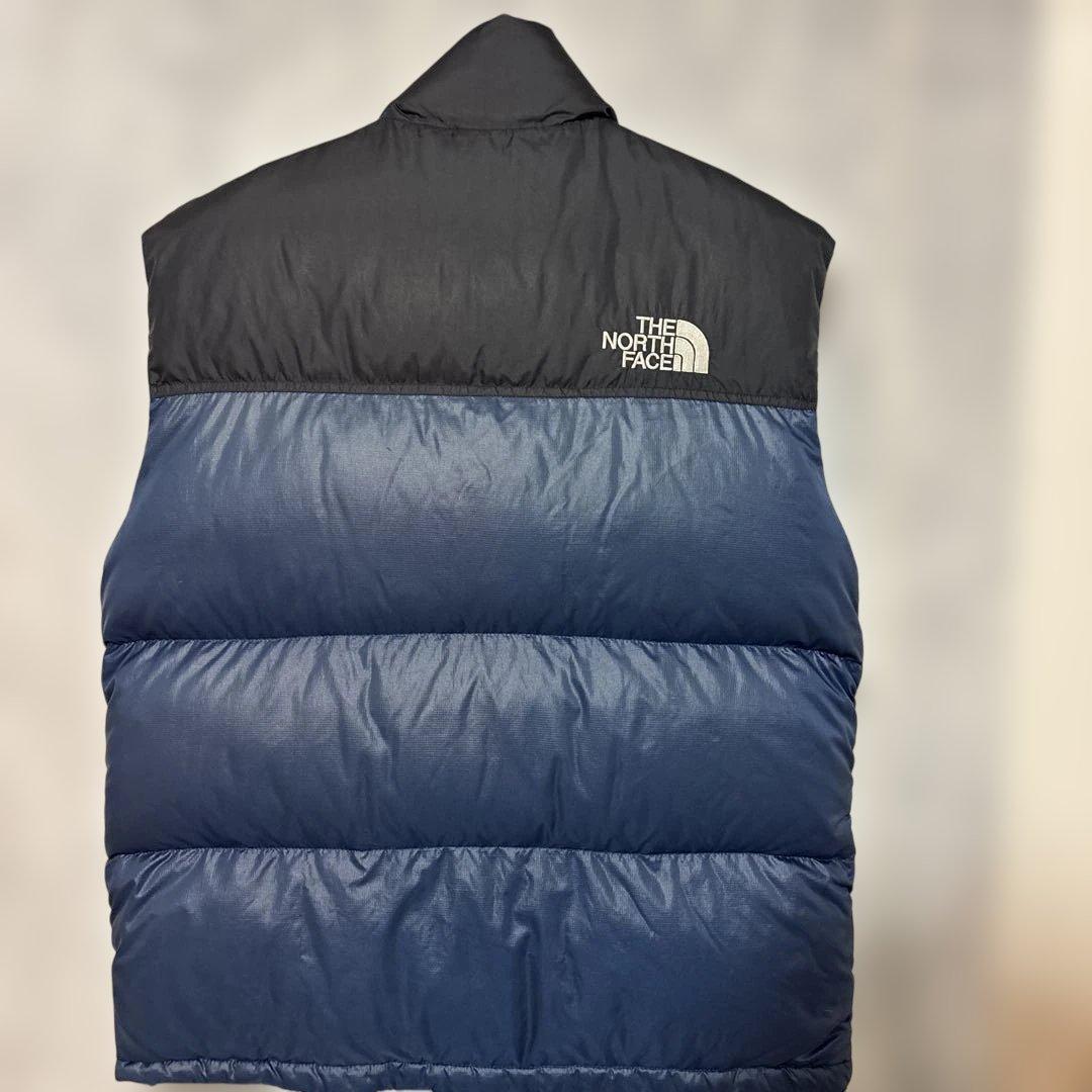 ノースフェイスヌプシダウンベスト700フィル刺繍口ゴドローコード