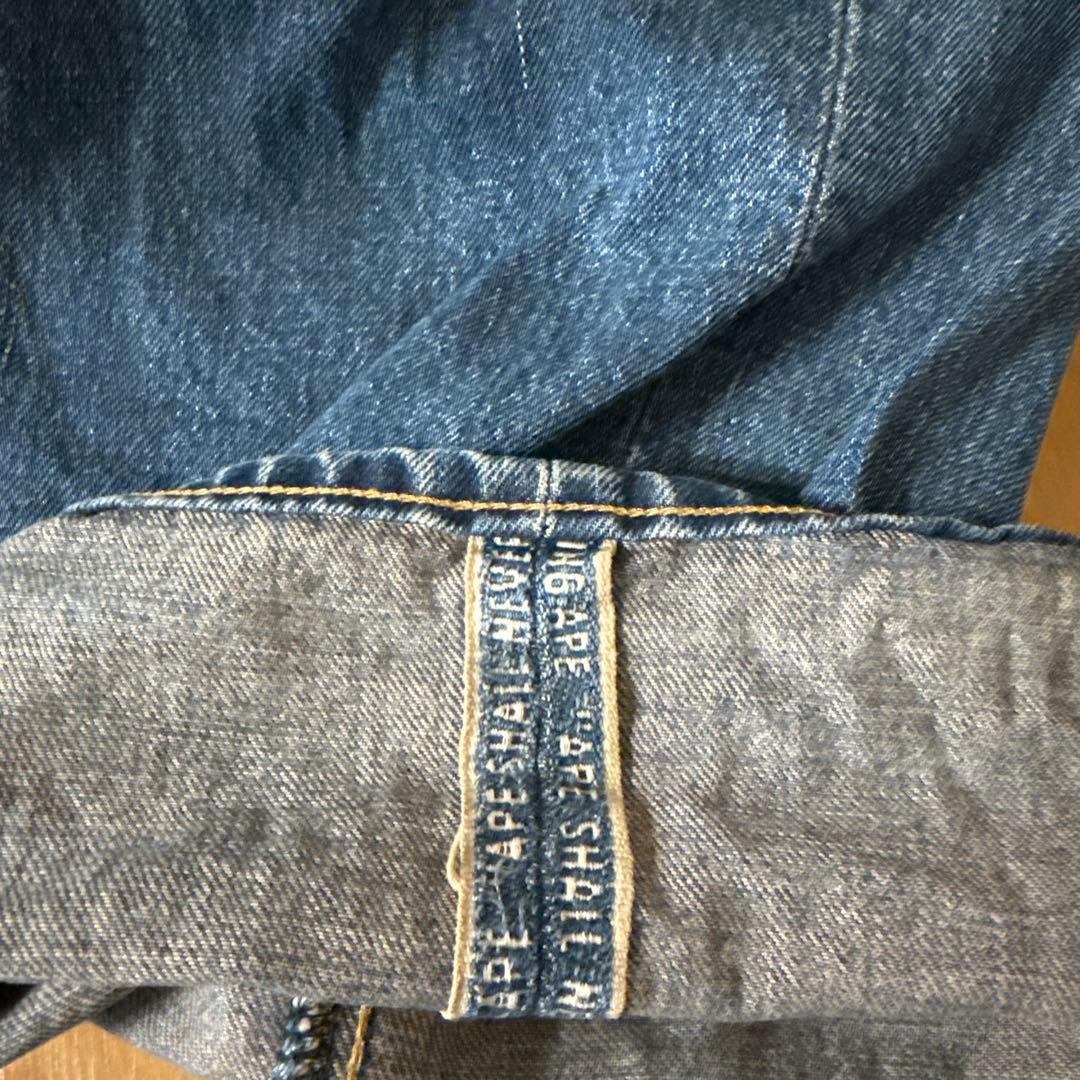 【服と書いて人】A BATHING APE 顔プリントデニムパンツ