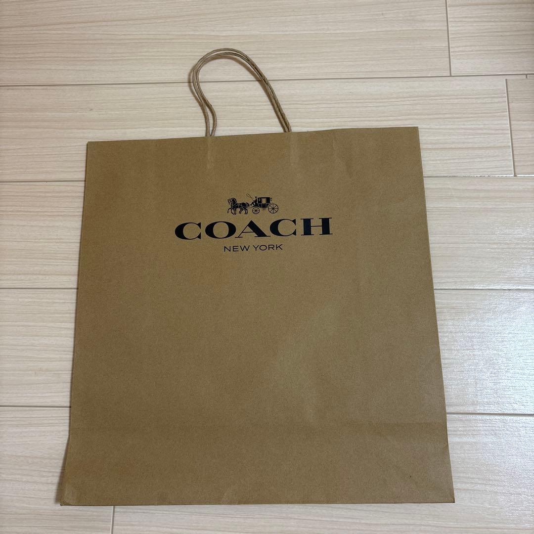 COACH フード付きベージュポンチョ