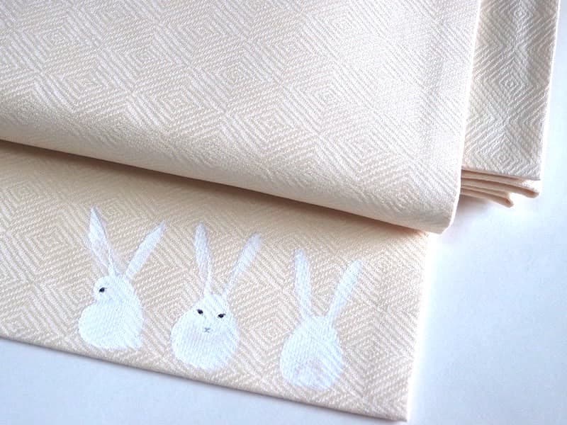 織りの名古屋帯（たれ先にうさぎ文）長383 手描き染　ガード加工済　正絹美品