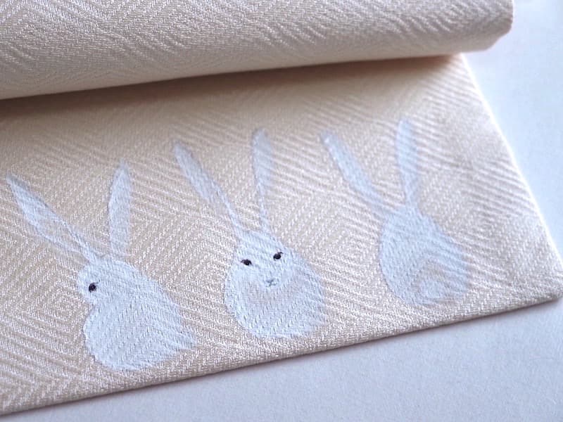 織りの名古屋帯（たれ先にうさぎ文）長383 手描き染　ガード加工済　正絹美品