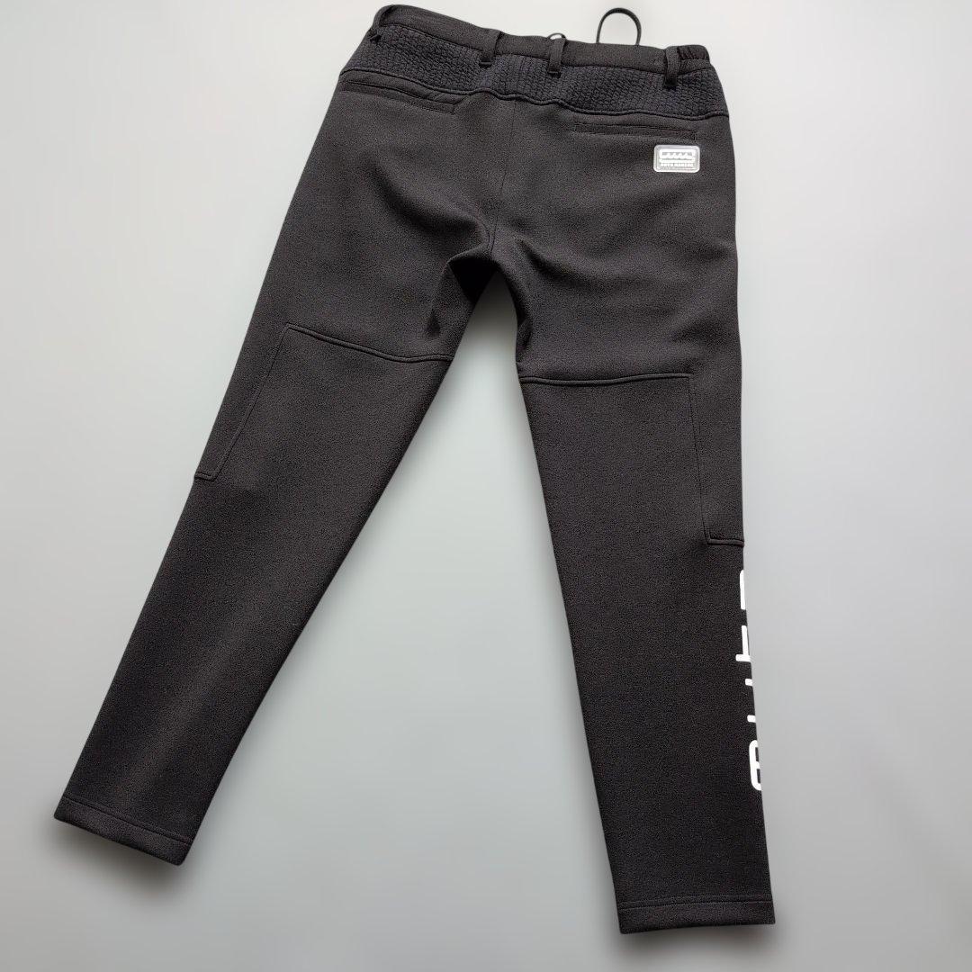 【未使用に近い】ムータマリンゴルフ　ストレッチ　切替しパンツ　M 黒