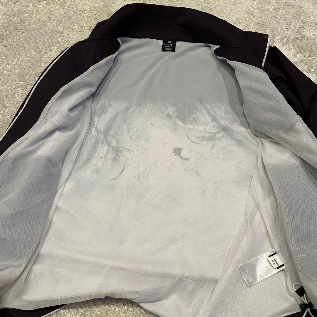 特大　オークリー　ジャケット　ナイロン　総柄　メンズ　サイズXL スカル　ロゴ