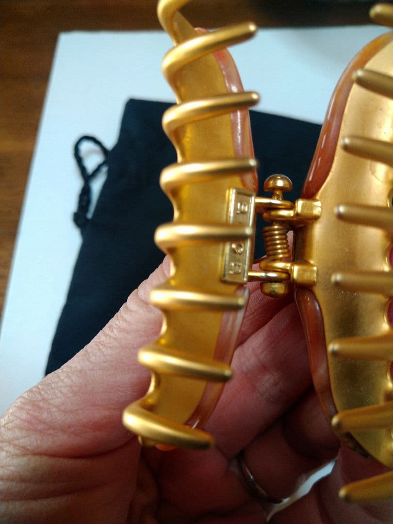 accaマーブル オレンジ系 ヘアクリップ