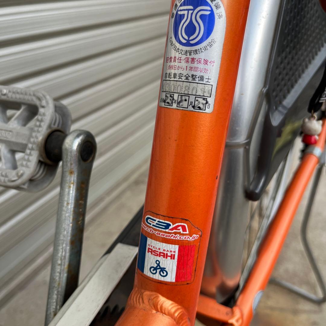 26インチオレンジ シティサイクル 前バスケット付き