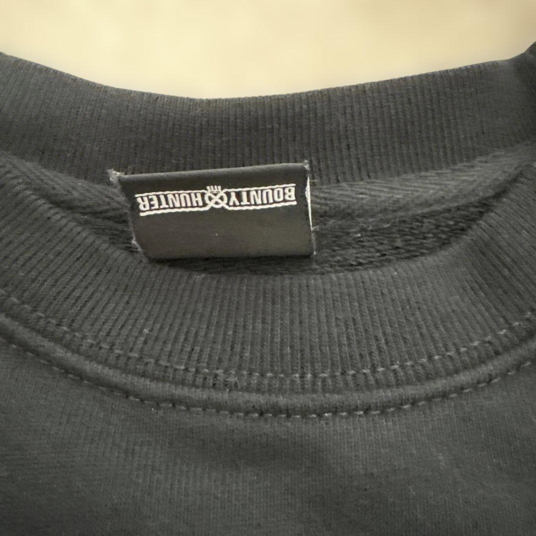 バウンティハンター　ブラック グラフィックプリント スウェット