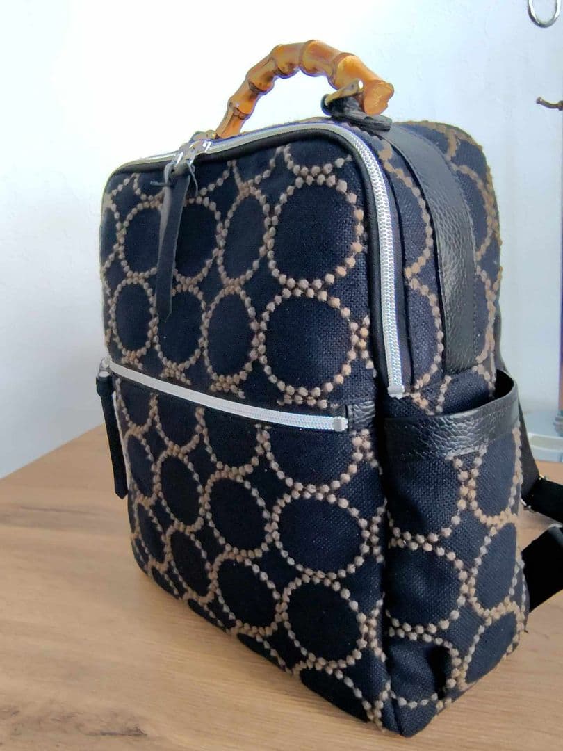 ミナペルホネン/タンバリンBK×カーキ/A4バンブーリュック本革黒