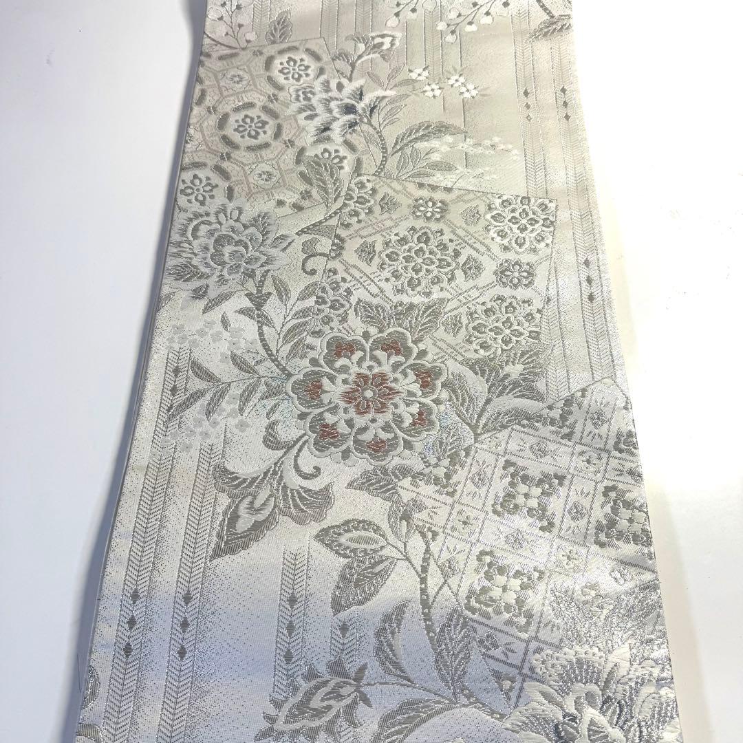5k2480 袋帯　絹　唐織　正倉院文様　華文　白　銀色　ピンク　青　花柄　和装