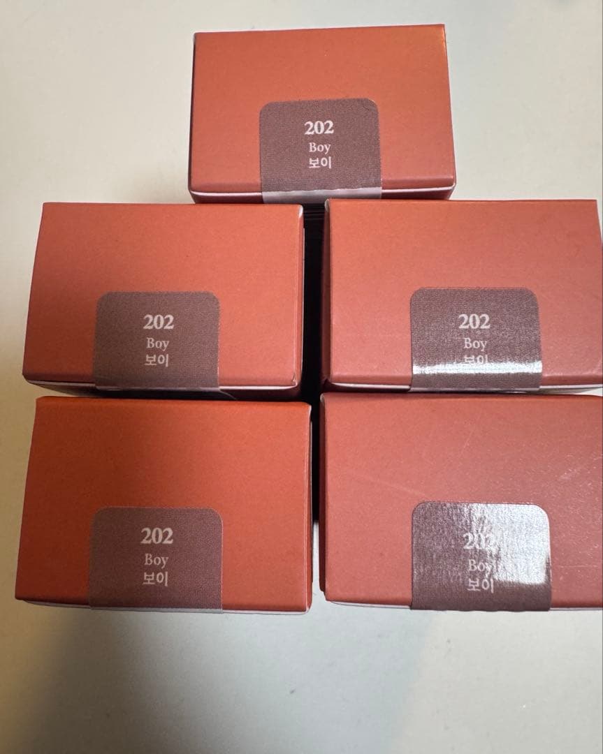 ラカ　ボンディンググロウリップスティック　202