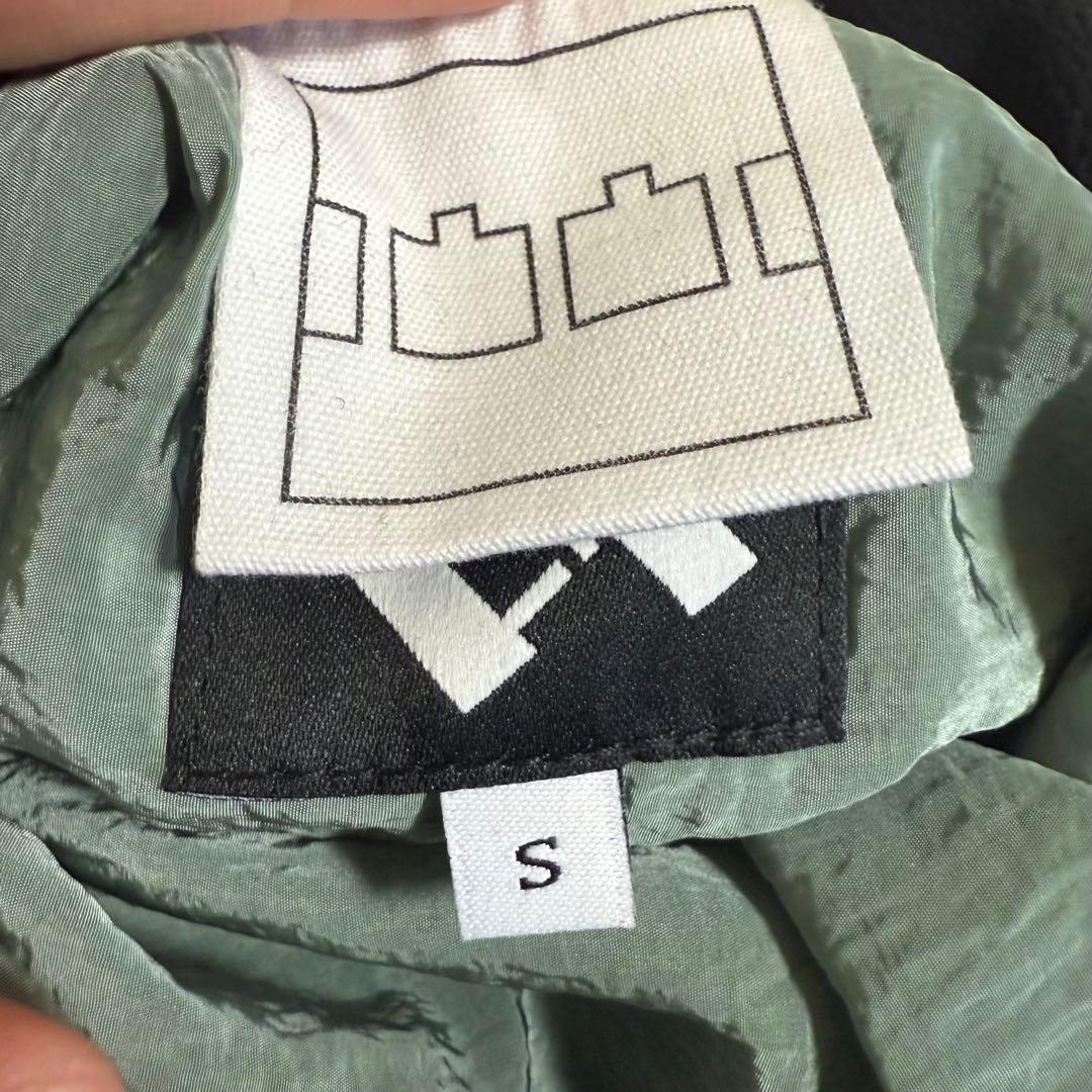 THE TRILOGY TAPES リバーシブル ボアフリースベスト 黒 緑