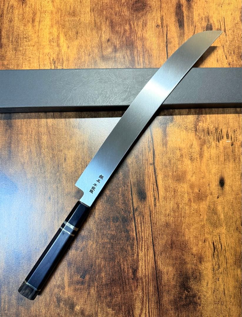 【堺打刃物】祥太郎作　蛸引 先丸　包丁　尺一　銀三鋼　鬼反り黒檀銀巻八角水牛柄