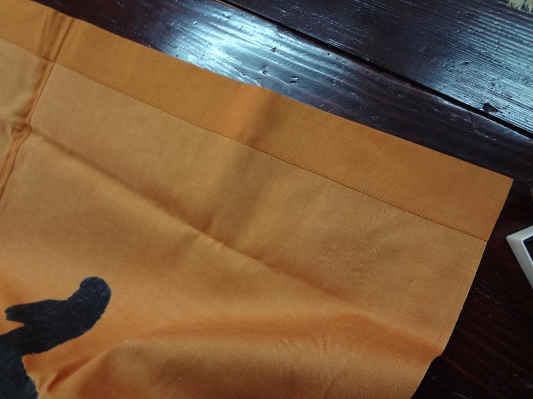 明るい茶系ののれん ようこそようこそデザイン