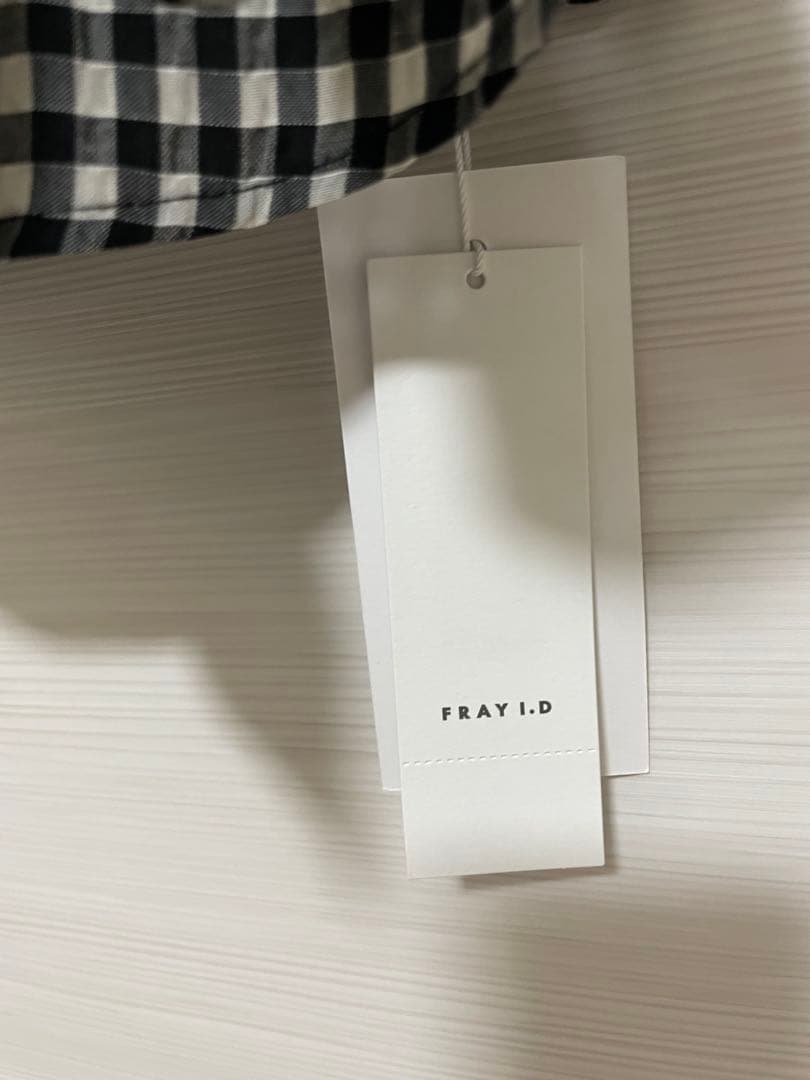 タグ付きFRAY I.D ペプラムリボントップス