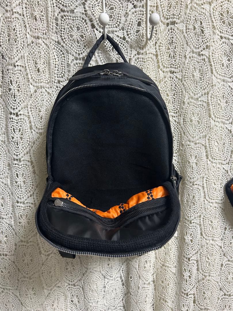 50830A ミナペルホネンハーフハンドメイドリュック　 ミニポーチ付き